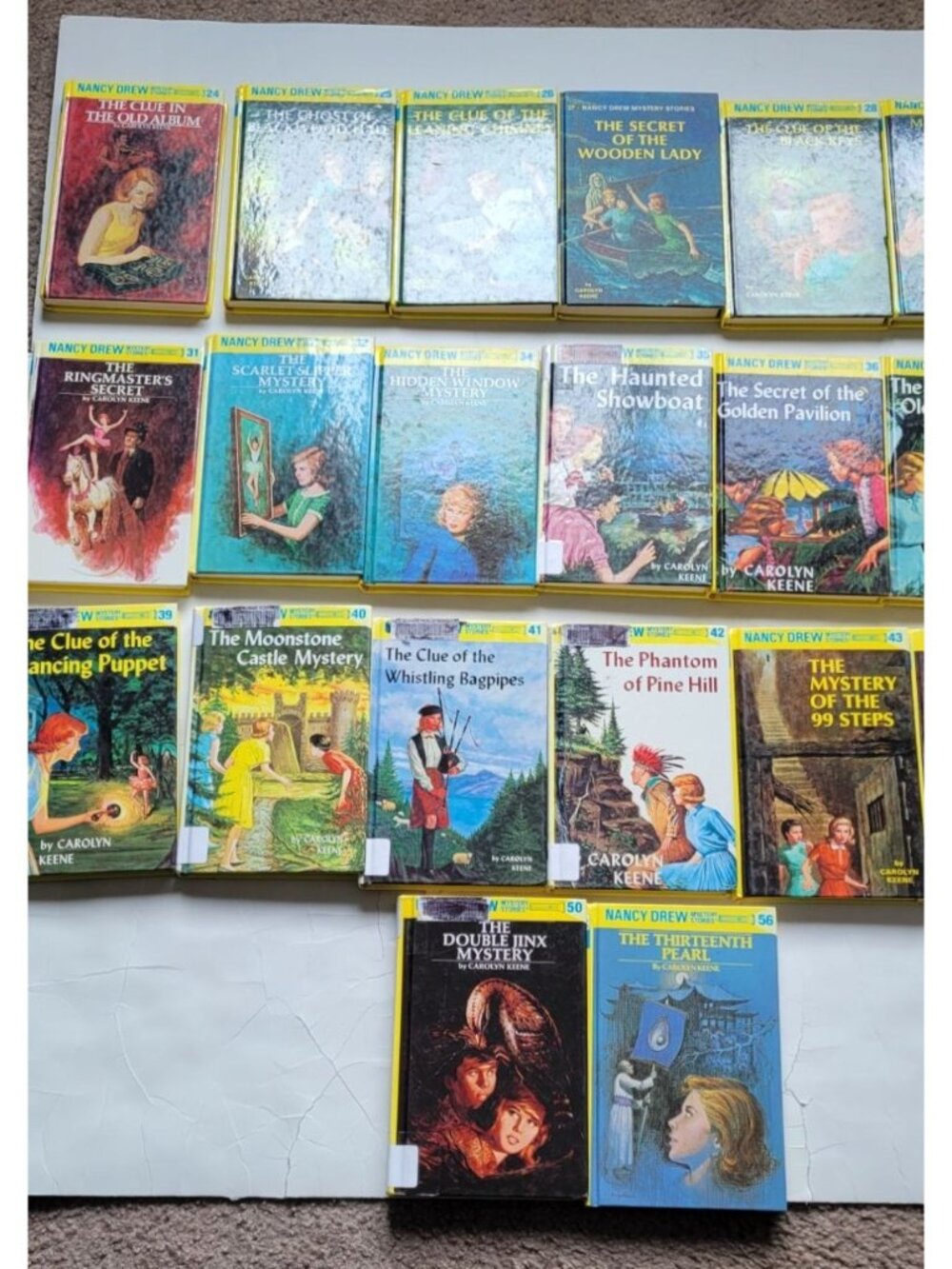 collection of vintage hardcover Nancy Drew Mystery Stories books by Carolyn Kee